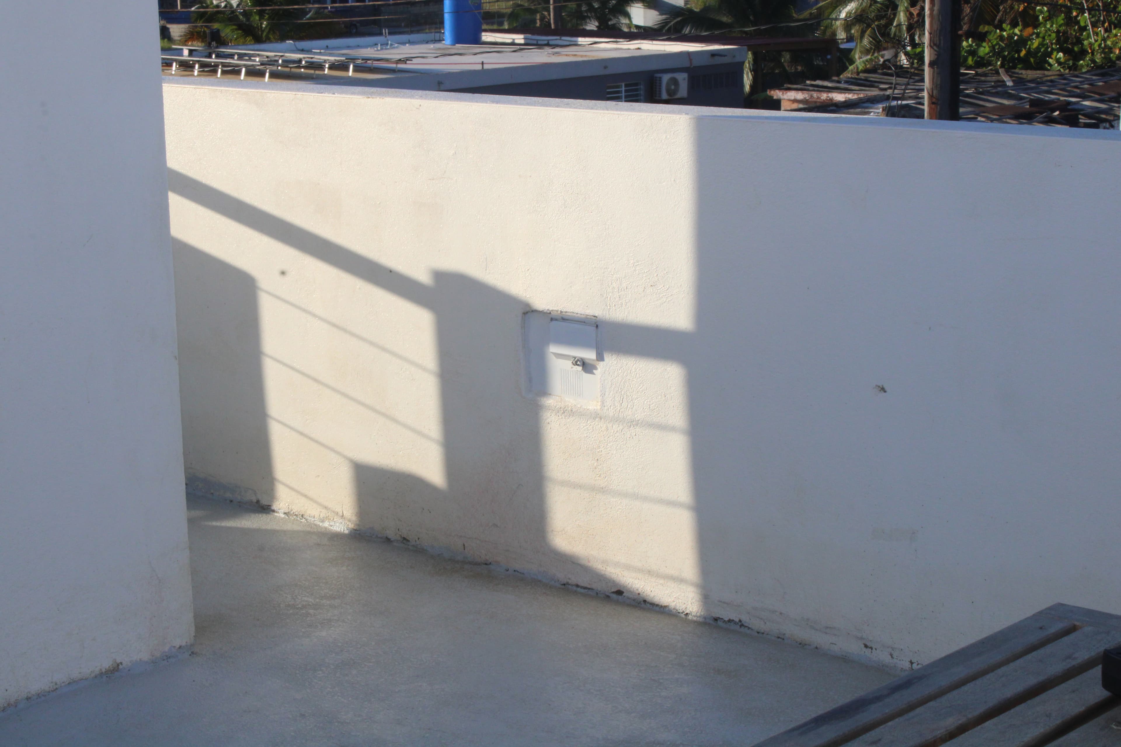 AC breaker panel on the rooftop wall