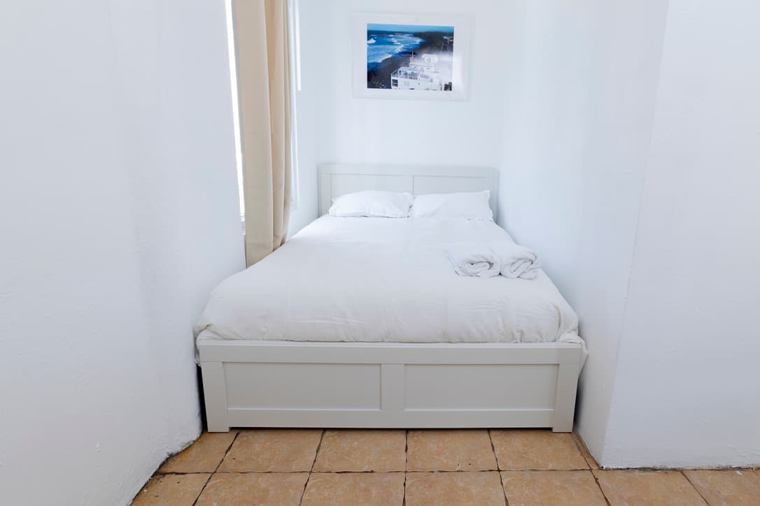 Full-size bed in Bedroom 4