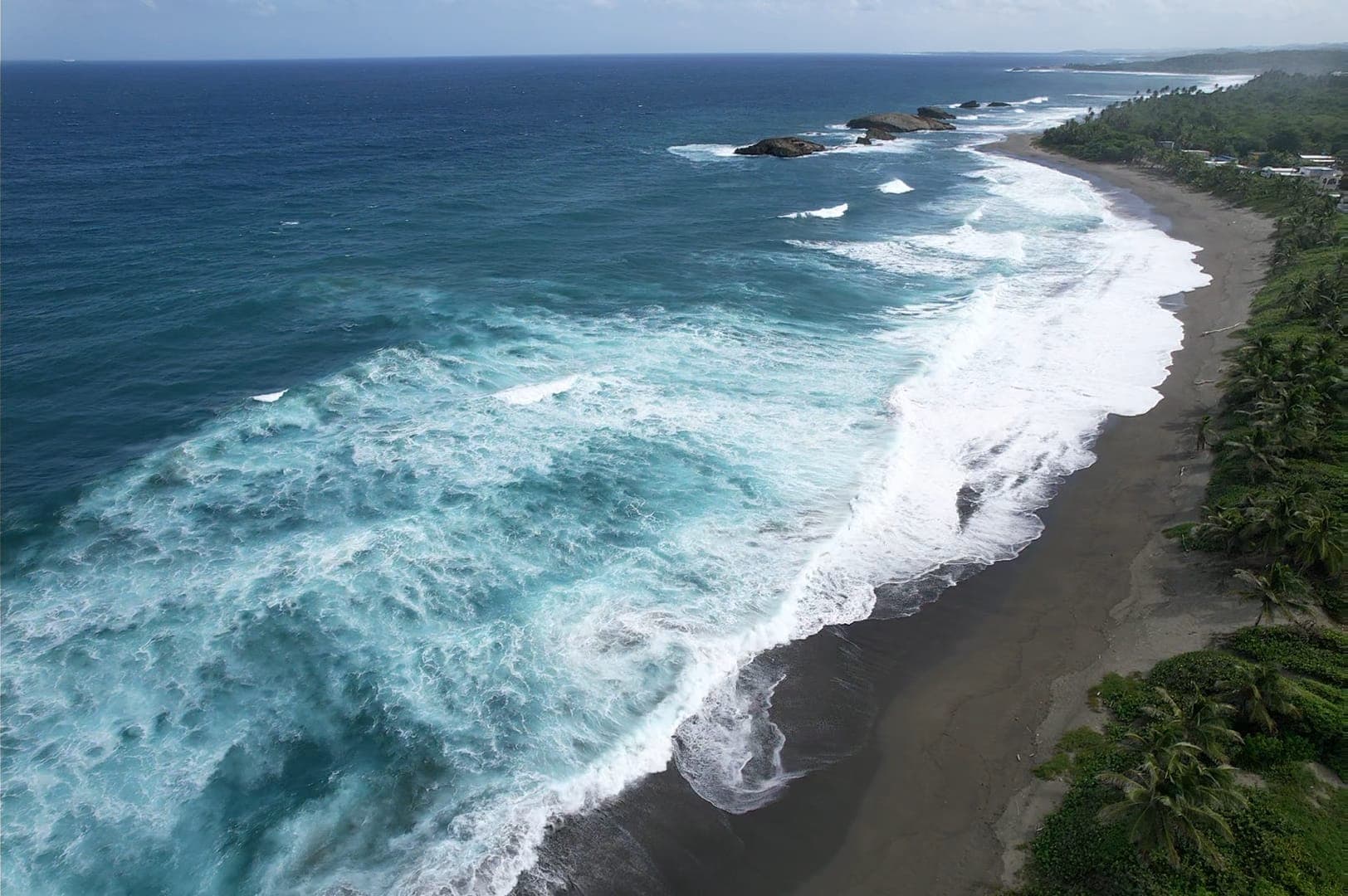 Drone view of the coastline near Arenas Negra