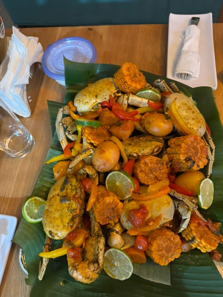Seasonal local crab feast served family-style at Arenas Negra
