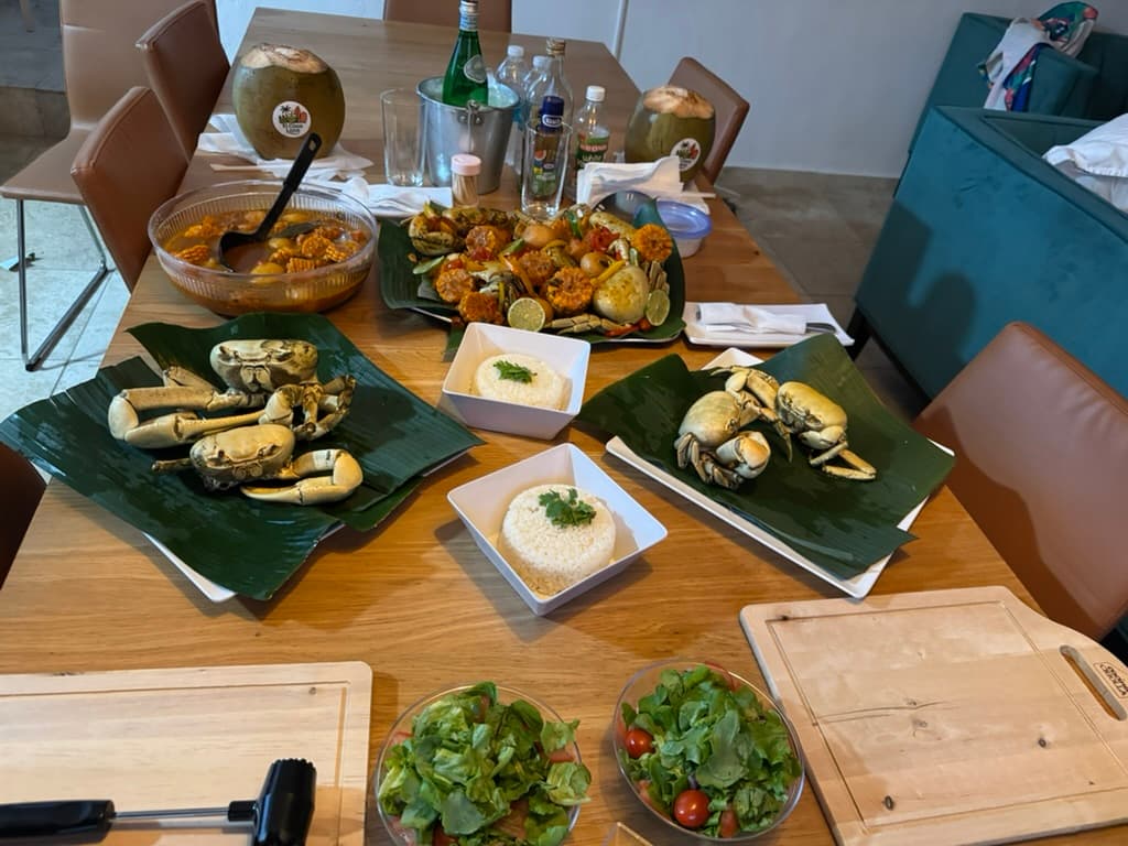 Full table setup for a seasonal local crab feast at the villa