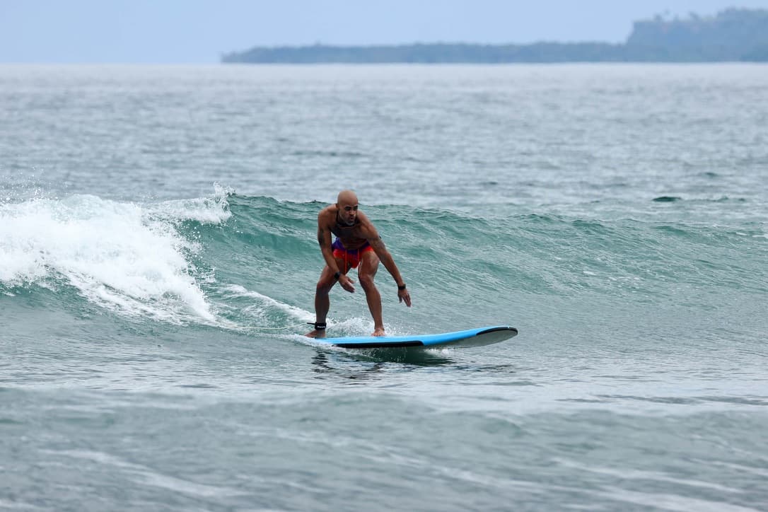 Surfer riding a wave on the north coast