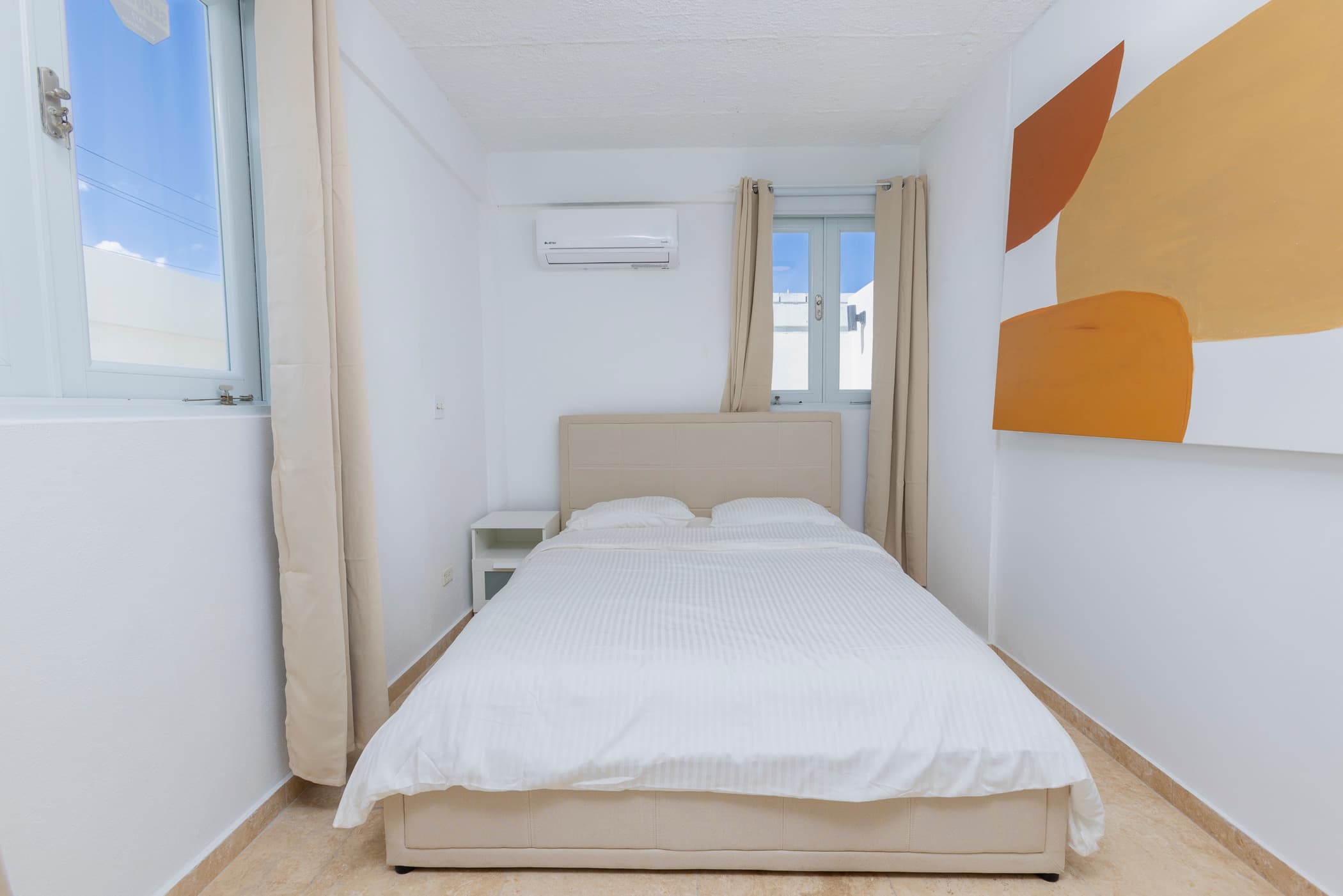 Family room with queen bed and built-in bunks