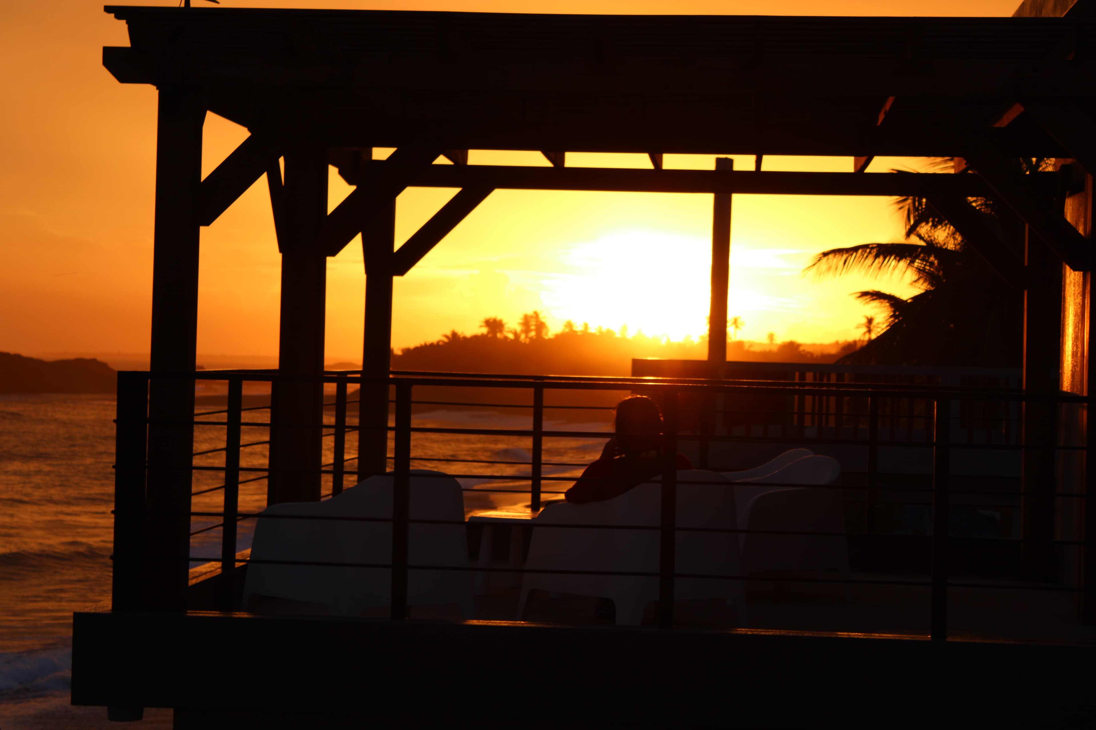 Silhouette on the rooftop at sunset
